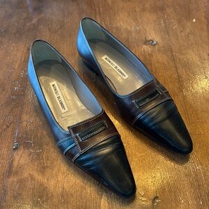 Gently used Manolo Blahnik leather flats in brown and black. Euro size 38, US 8